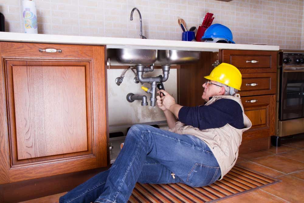 plumber at work to fix a sink Stockdale, CA plumber at work to fix a sink Stockdale, CA