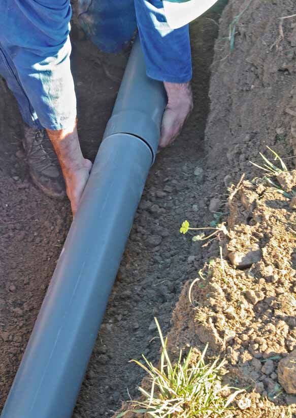 Connection in the trench of the PVC sanitation pipes. Connection in the trench of the PVC sanitation pipes.
