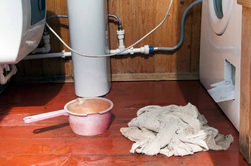 Fllod In Bathroom Flood in a bathroom with home appliances in the background