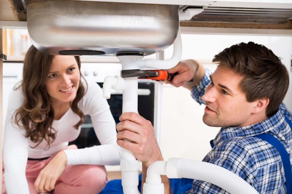 plumber fixing pipe under sink plumber fixing pipe under sink